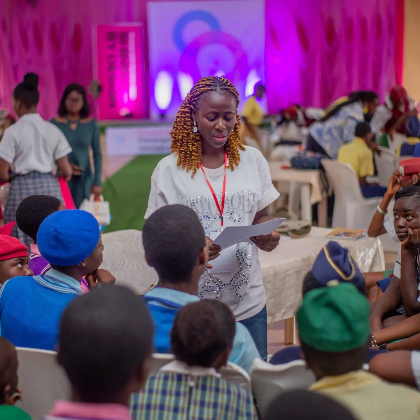 A Peerless mentor listening to girls during a group session